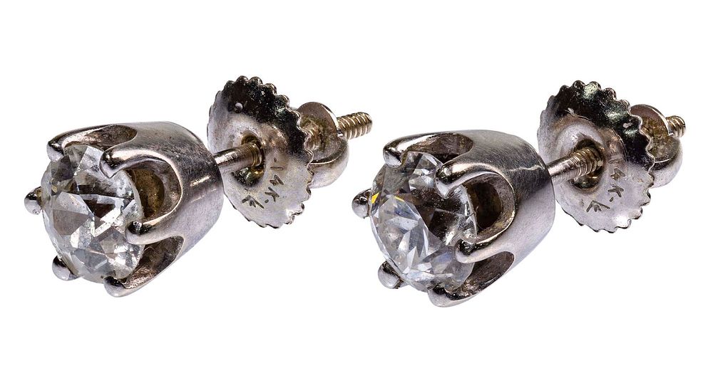 Lot 516: 14k White Gold and Diamond Stud Earrings