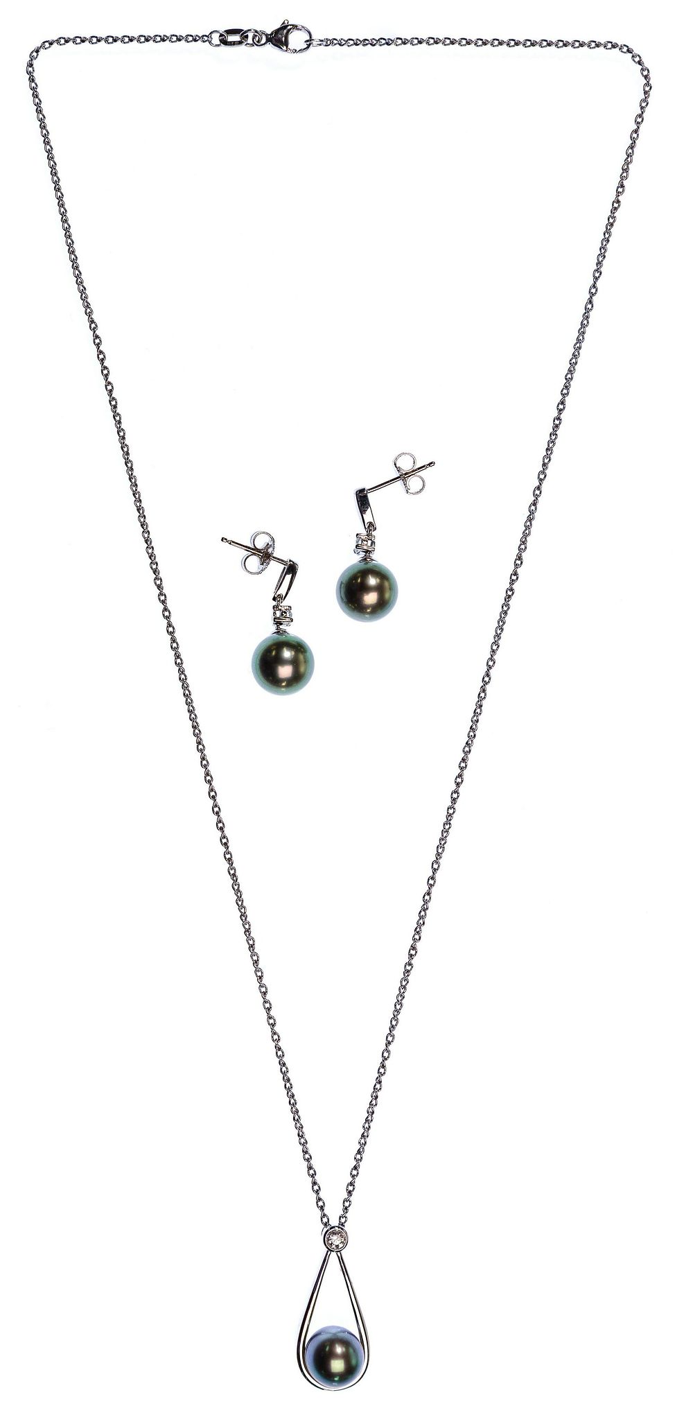 Lot 563: White Gold, Pearl and Diamond Jewelry Suite