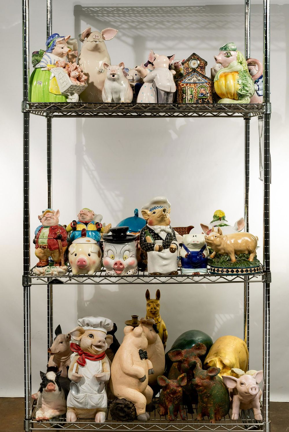 Lot 381: Porcelain, Ceramic and Composite Pig Assortment