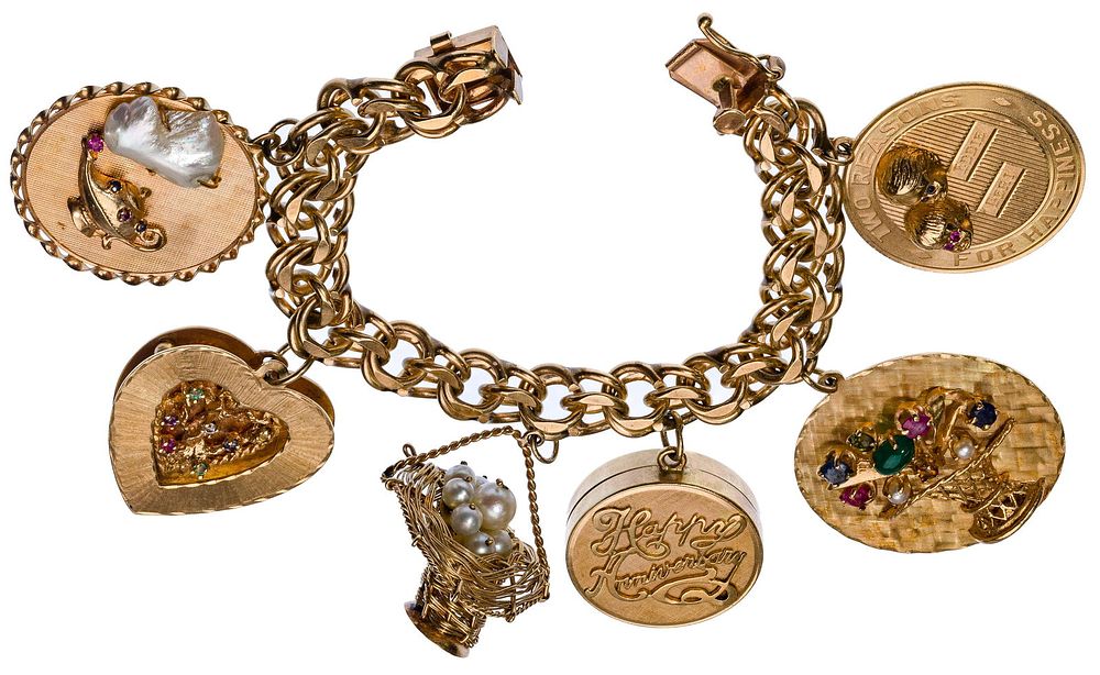 Lot 427: 14k Yellow Gold Charm Bracelet
