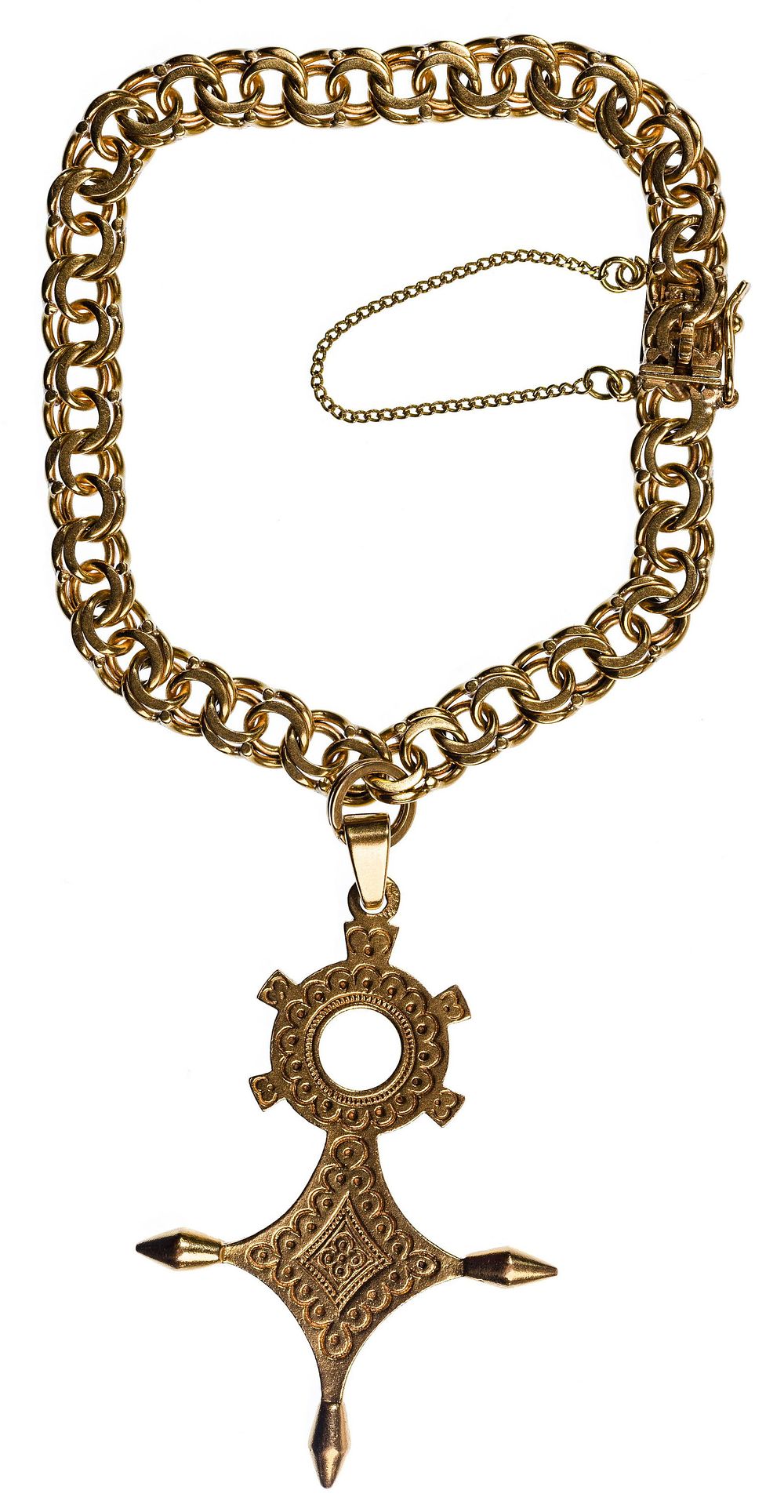 Lot 483: Yellow Gold Charm Bracelet