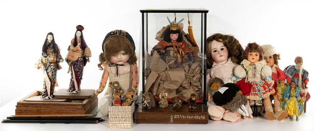 Lot 304: Doll and Case Assortment