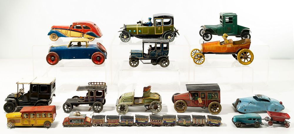 Lot 357: Tin Toy Car and Train Assortment