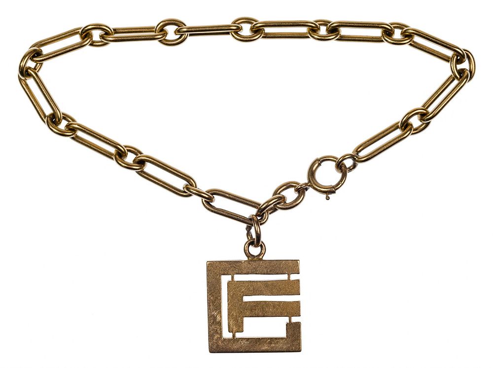 Lot 395: 14k Yellow Gold Link Bracelet and Charm