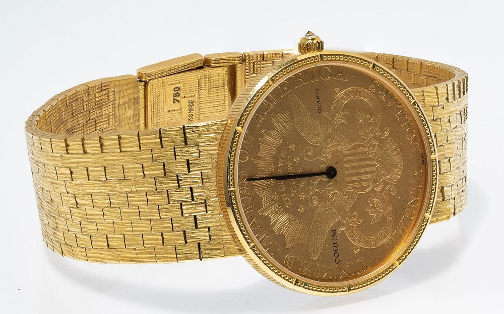 Lot 467: Corum 18k Gold Coin, Case and Band Wrist Watch