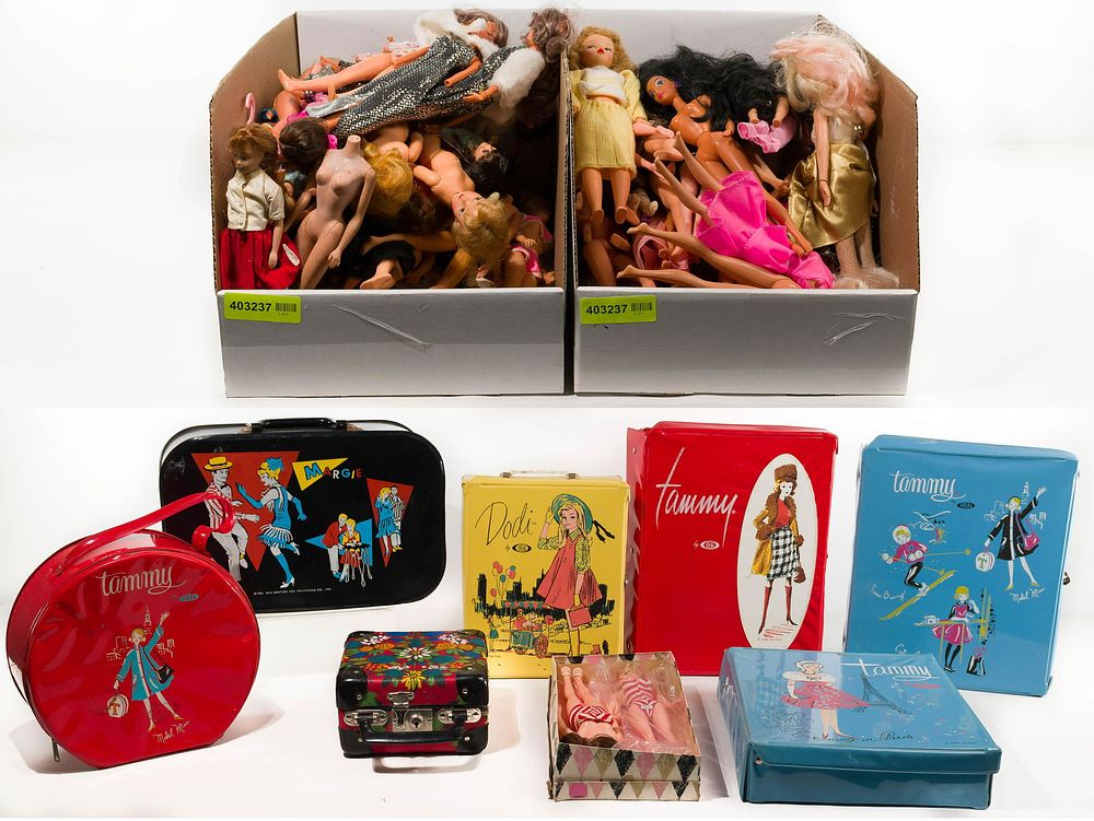 Lot 301: 12-inch Doll and Case Assortment