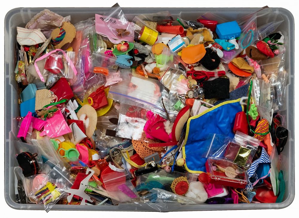 Lot 304: Barbie Clothing and Accessory Assortment