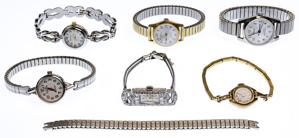 Lot 535: Eloga Platinum and Diamond Case Wrist Watch