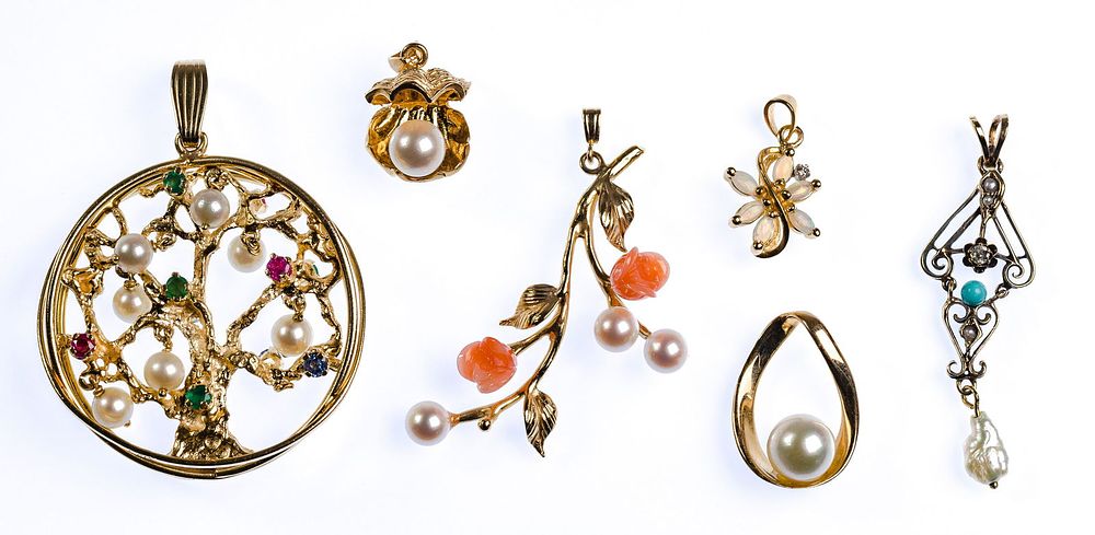 Lot 442: 14k Gold and Pearl Pendant / Charm Assortment