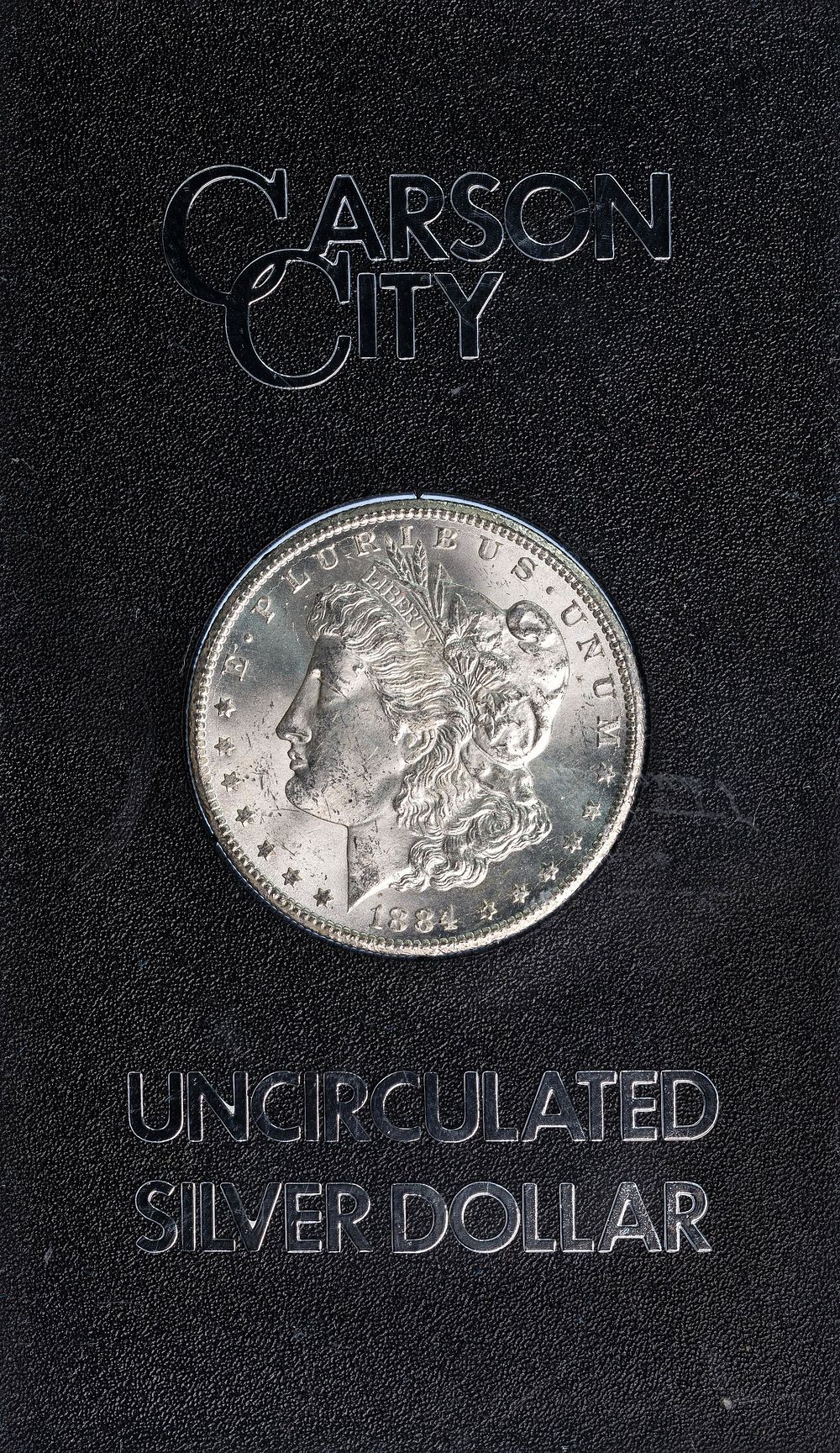 Lot 555: 1884-CC $1 GSA MS-63