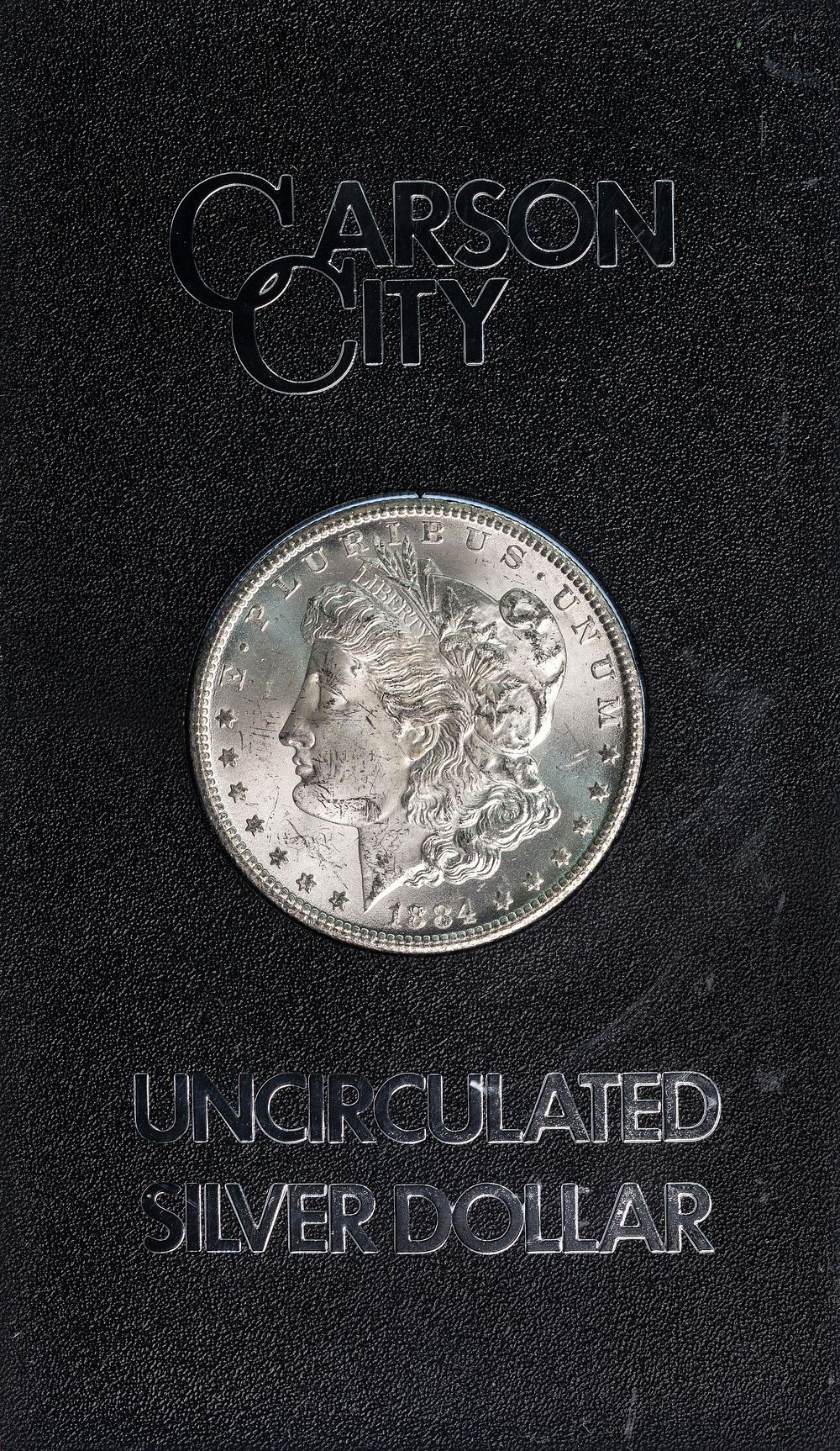 Lot 556: 1884-CC $1 GSA MS-63