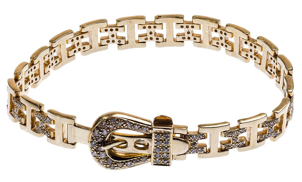 Lot 276: 14k Gold and Diamond Bracelet