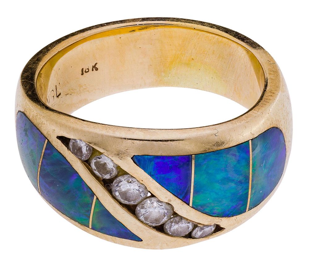 Lot 283: Nagalle 14k Yellow Gold and Fire Opal Ring