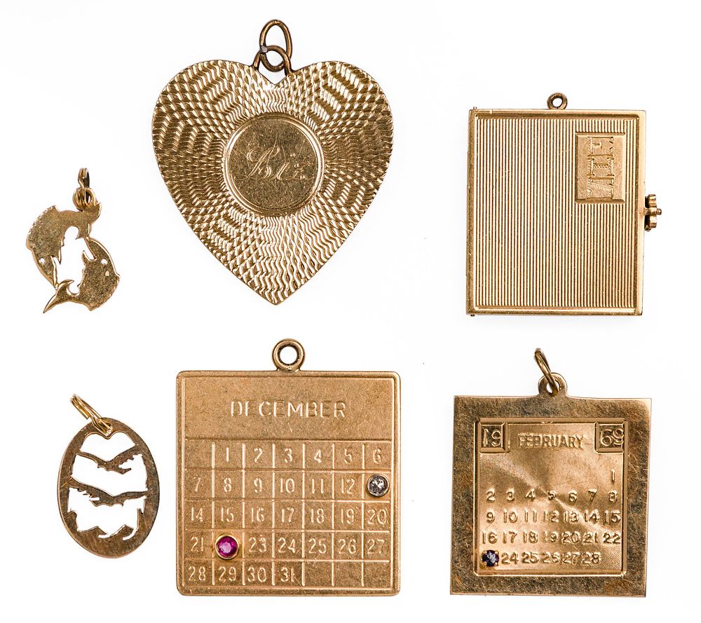 Lot 287: 14k Yellow Gold Charm Assortment