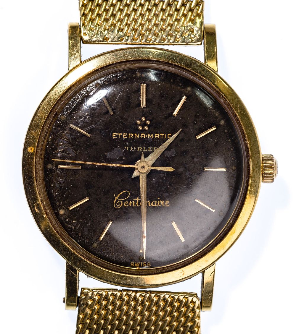 Lot 316: Eterna-Matic Centenaire 18k Gold Case and Band Wrist