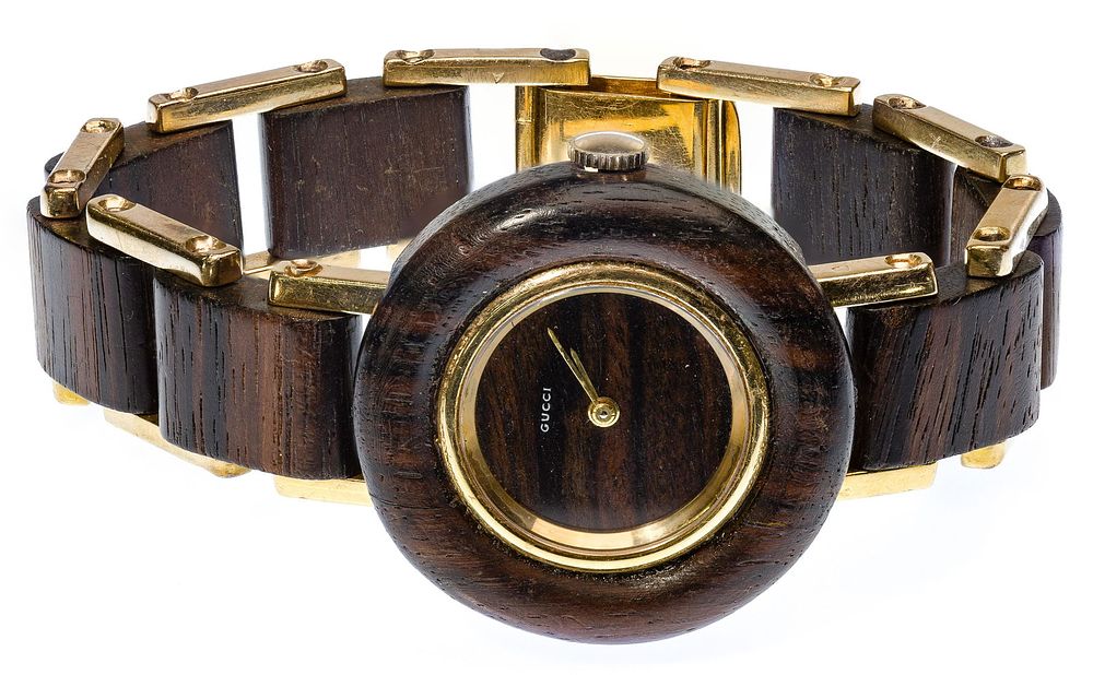 Lot 316: Gucci 18k Yellow Gold and Exotic Wood Wrist Watch