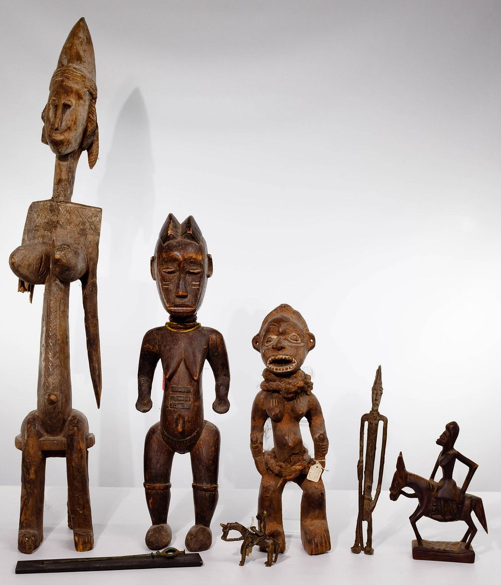 Lot 118: African Carved Wood and Metal Object Assortment