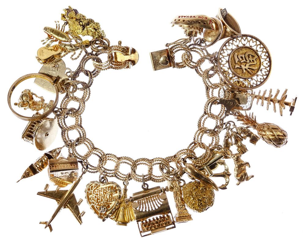 Lot 293: 14k Yellow Gold Charm Bracelet