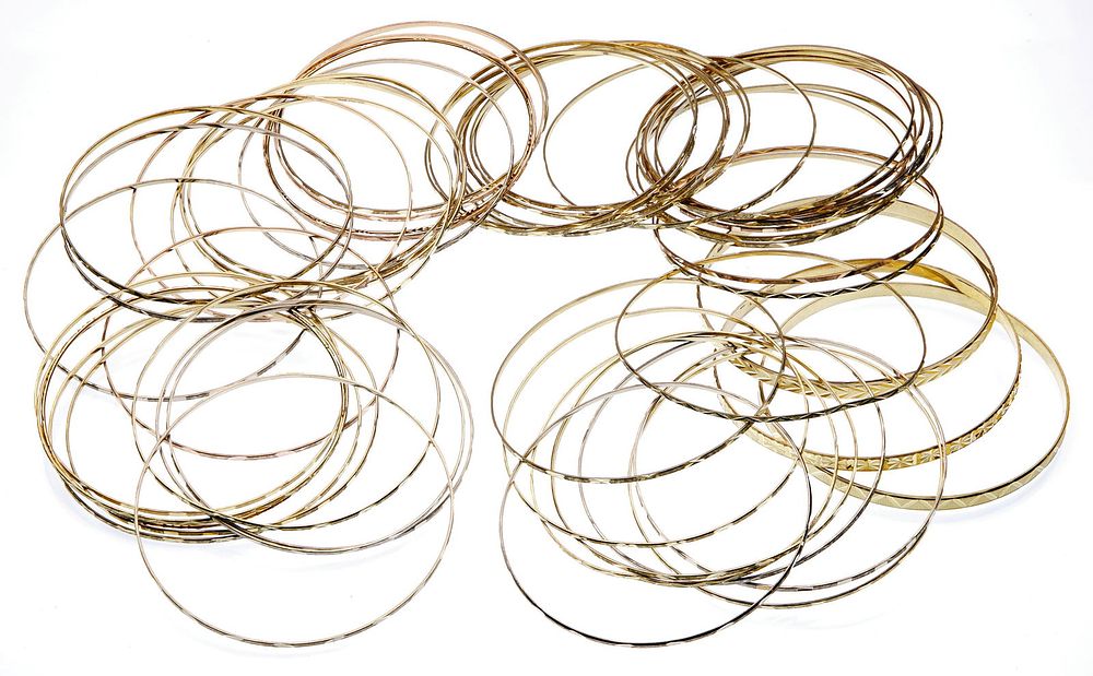 Lot 294: 14k Gold Bangle Bracelet Assortment