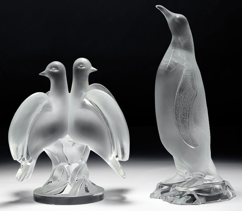 Lot 248: Lalique Crystal 'Ariane' Doves and Penguin Figurines