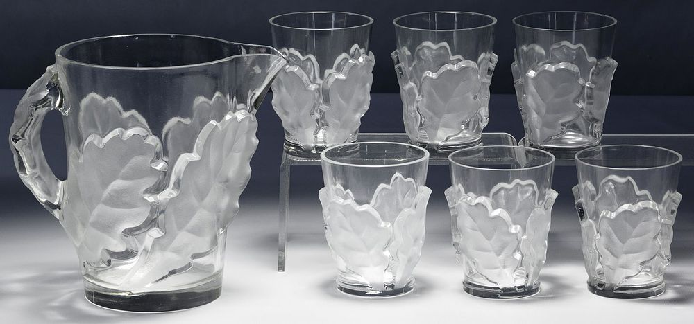 Lot 249: Lalique Crystal 'Chene' Pitcher and Glasses