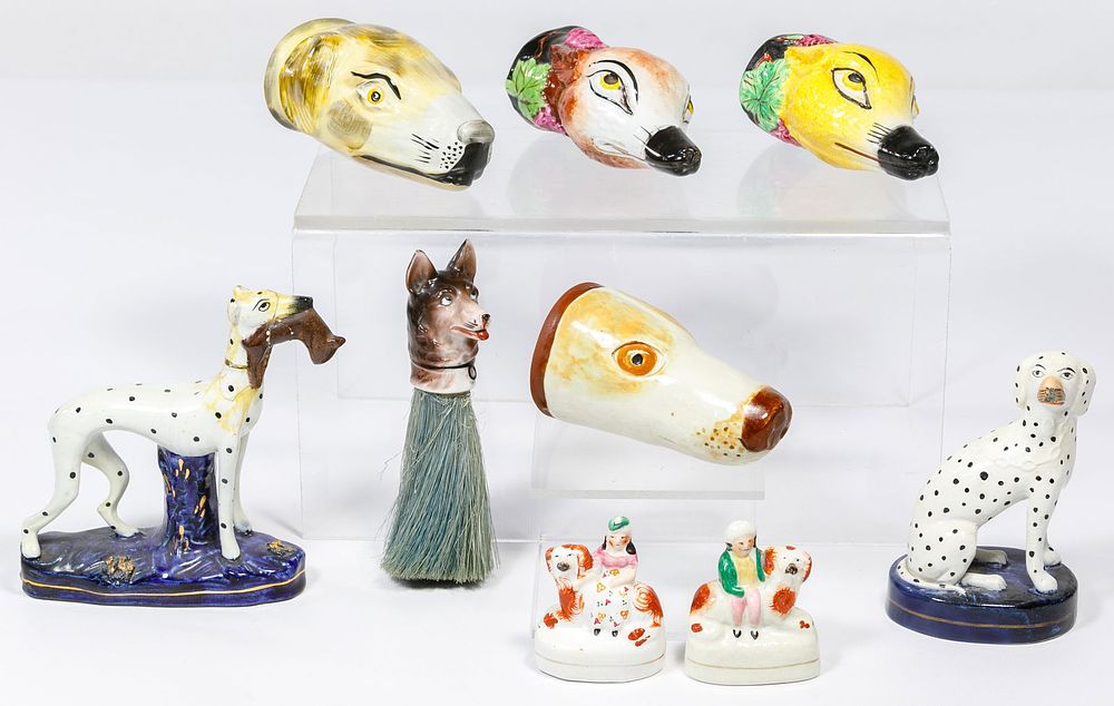 Lot 297: Staffordshire Stirrup Cups and Figurine Assortment