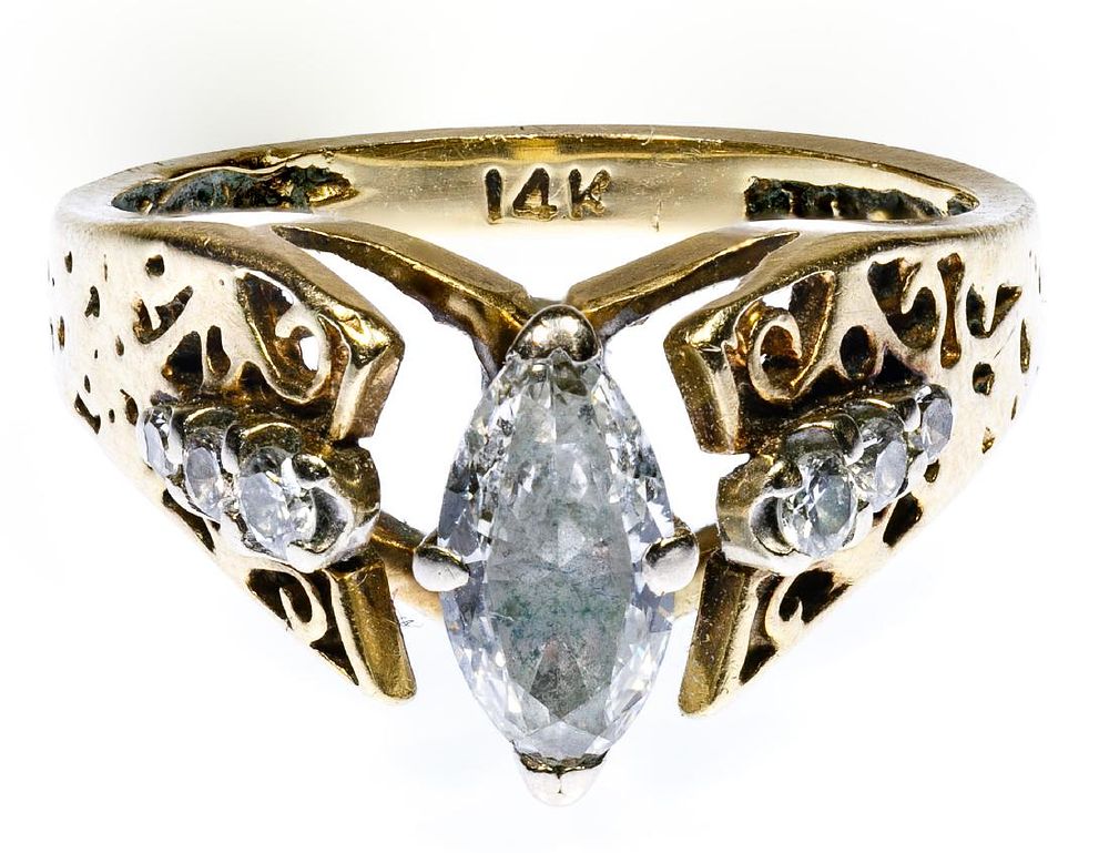 Lot 220: 14k Gold and Diamond Ring