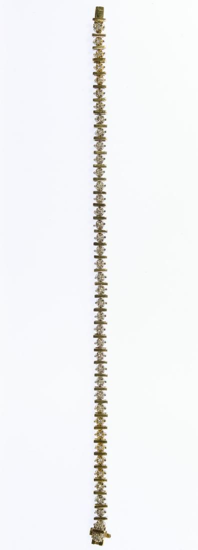 Lot 266: 10k Gold and Diamond Tennis Bracelet
