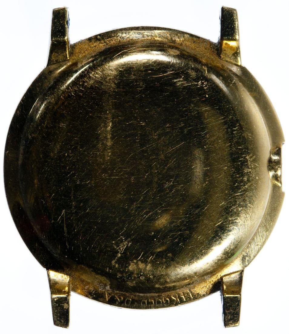 Lot 438: Rolex 14k Gold '11565' Case Back