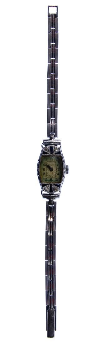 Lot 443: Bulova 14k White Gold, Sapphire and Diamond Case Wrist