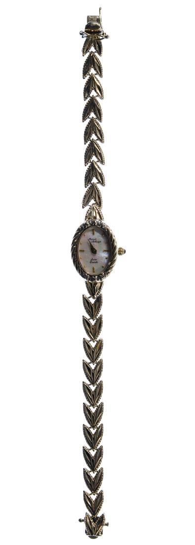 Lot 446: Michael Anthony 14k Gold Case and Band Wrist Watch