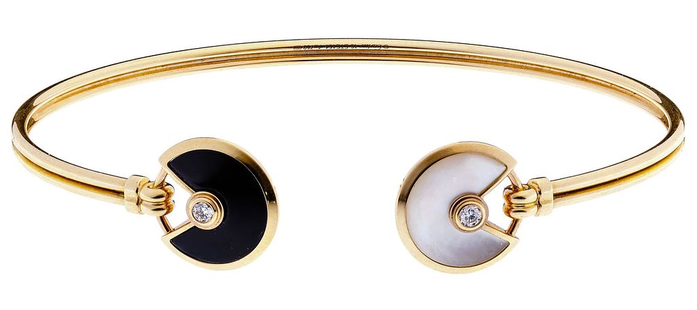 Lot 239: Cartier 18k Pink Gold 'Amulette de Cartier' Cuff Bracel