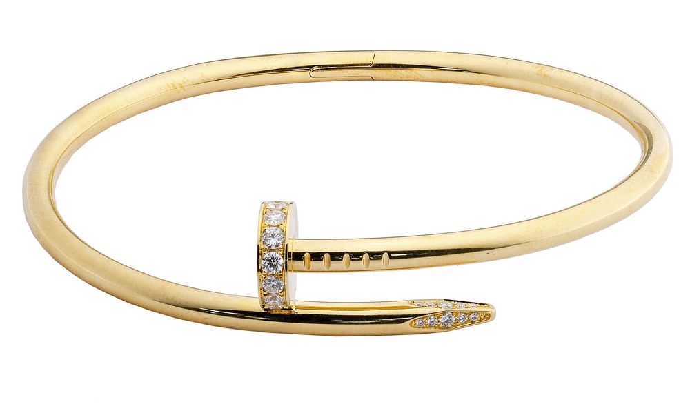 Lot 573: Cartier 18k Yellow Gold and Diamond 'Juste un Clou'