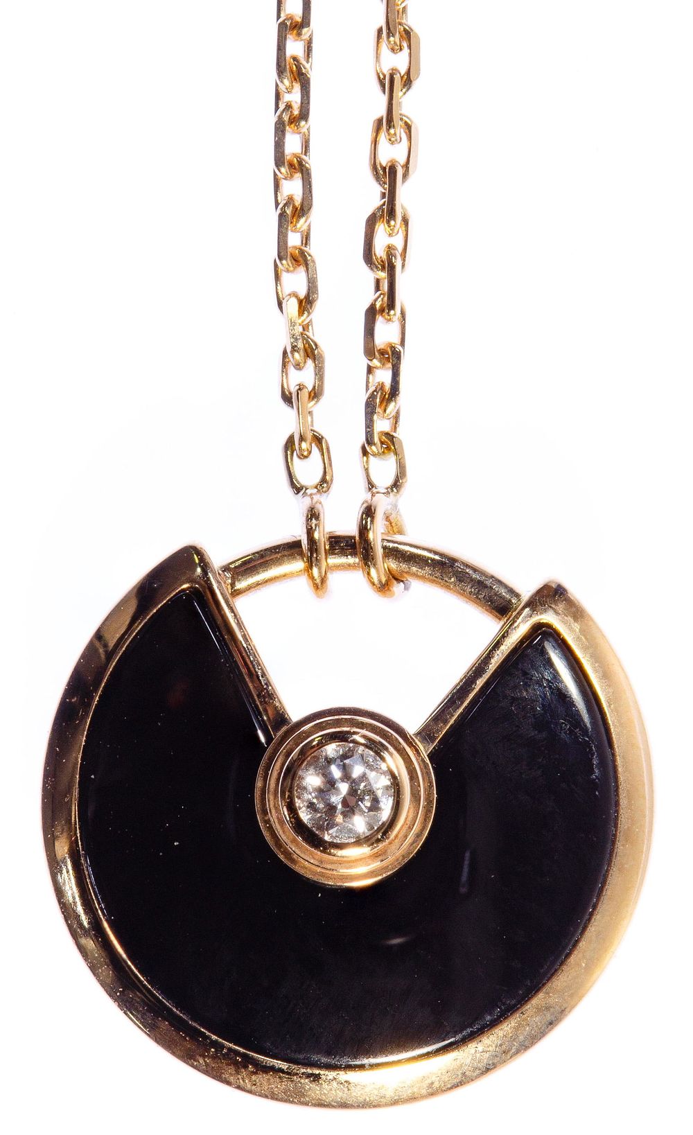 Lot 584: Cartier 18k Pink Gold, Onyx and Diamond 'Amulette de