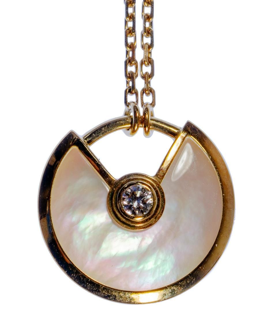 Lot 586: Cartier 18k Yellow Gold, Mother of Pearl and Diamond