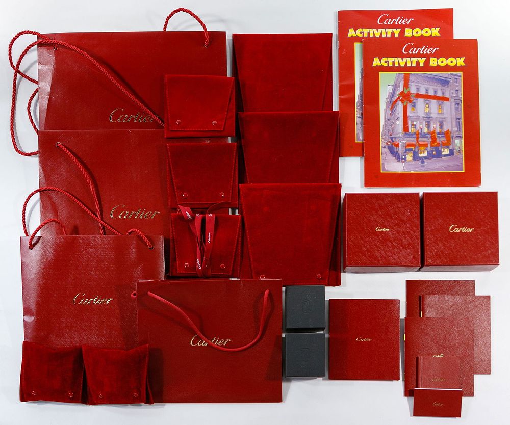 Lot 592: Cartier Box and Bag Assortment