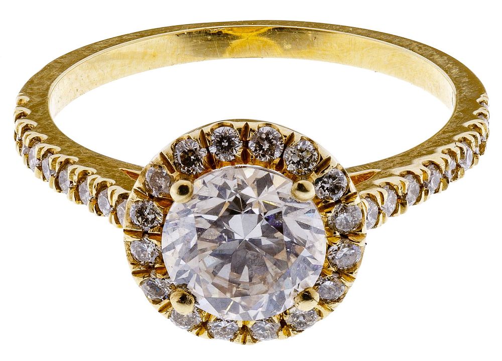 Lot 631: 18k Gold and Diamond Ring