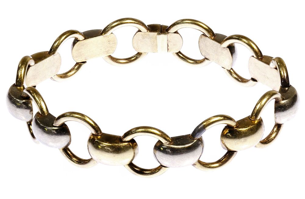 Lot 671: 8k White Gold and 8k Yellow Gold Link Bracelet
