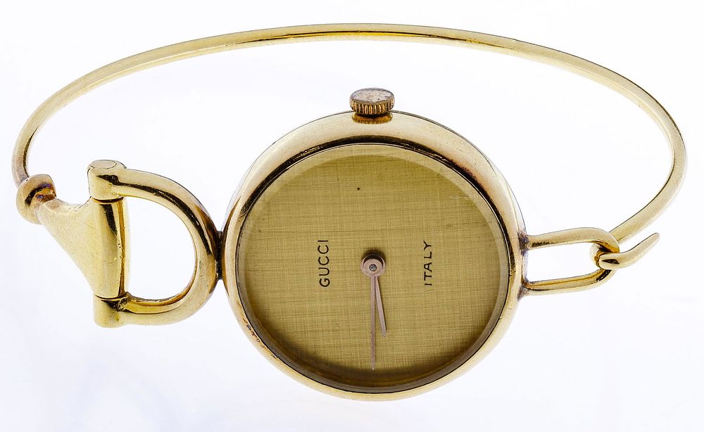 Lot 694: Gucci 18k Gold Wrist Watch