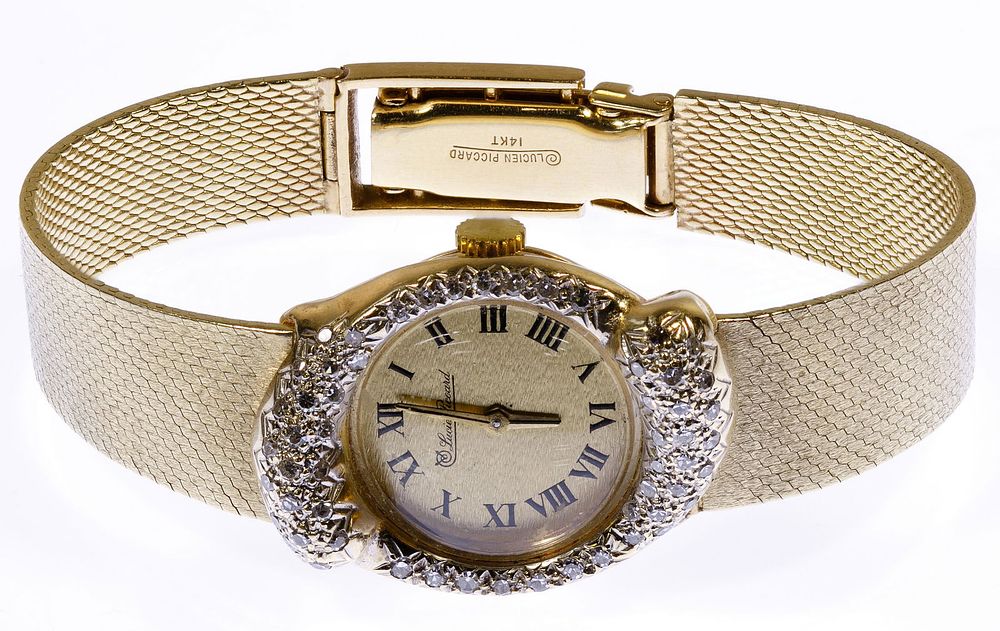 Lot 696: Lucien Piccard 14k Gold and Diamond Wrist Watch