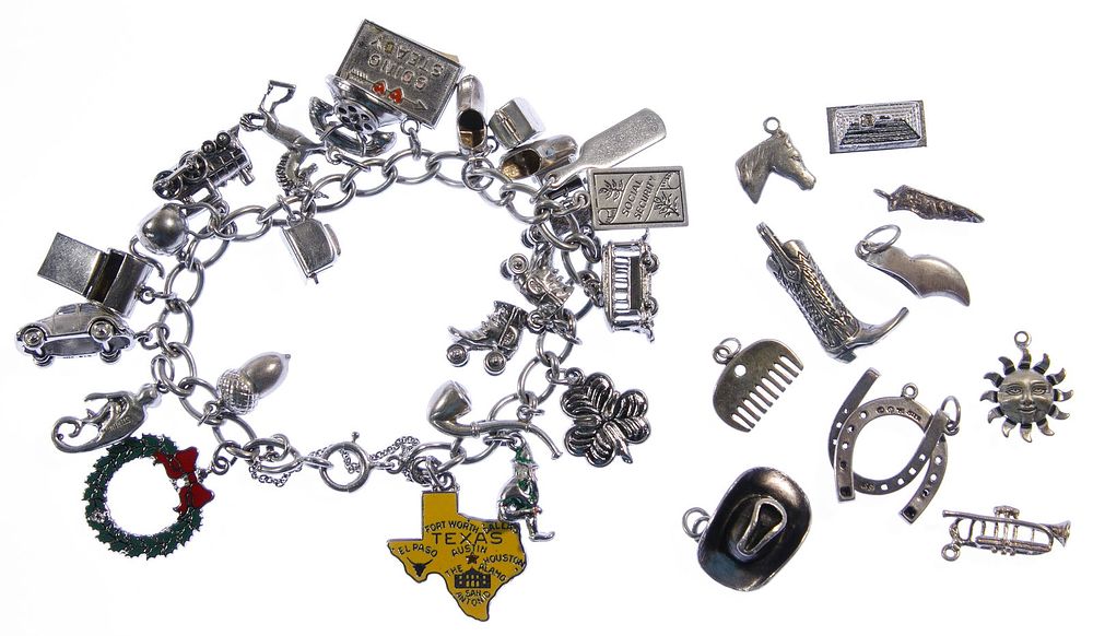 Lot 704: Sterling Silver Charm Bracelet