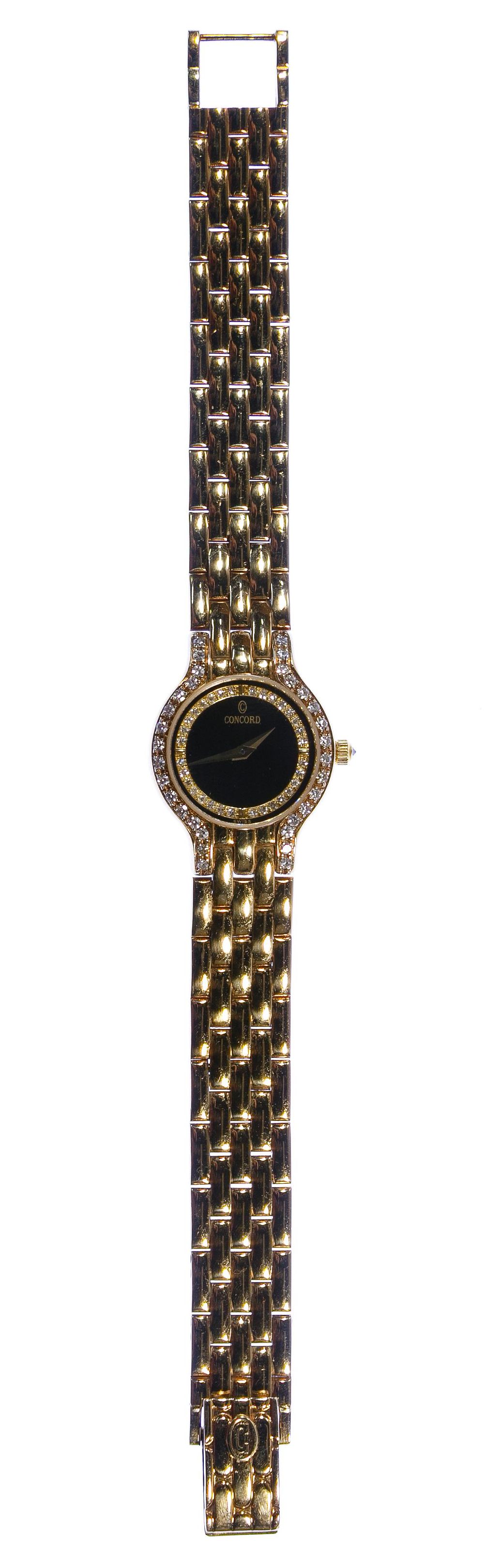Lot 524: Concord 14k Gold and Diamond Case and Band Wrist Watch