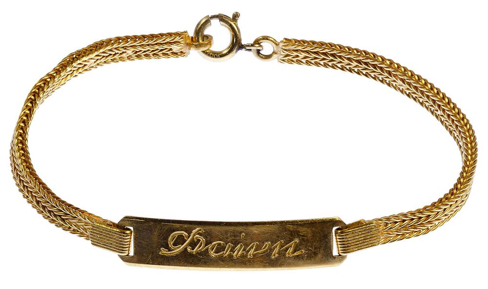Lot 416: 18k Gold Identification Bracelet