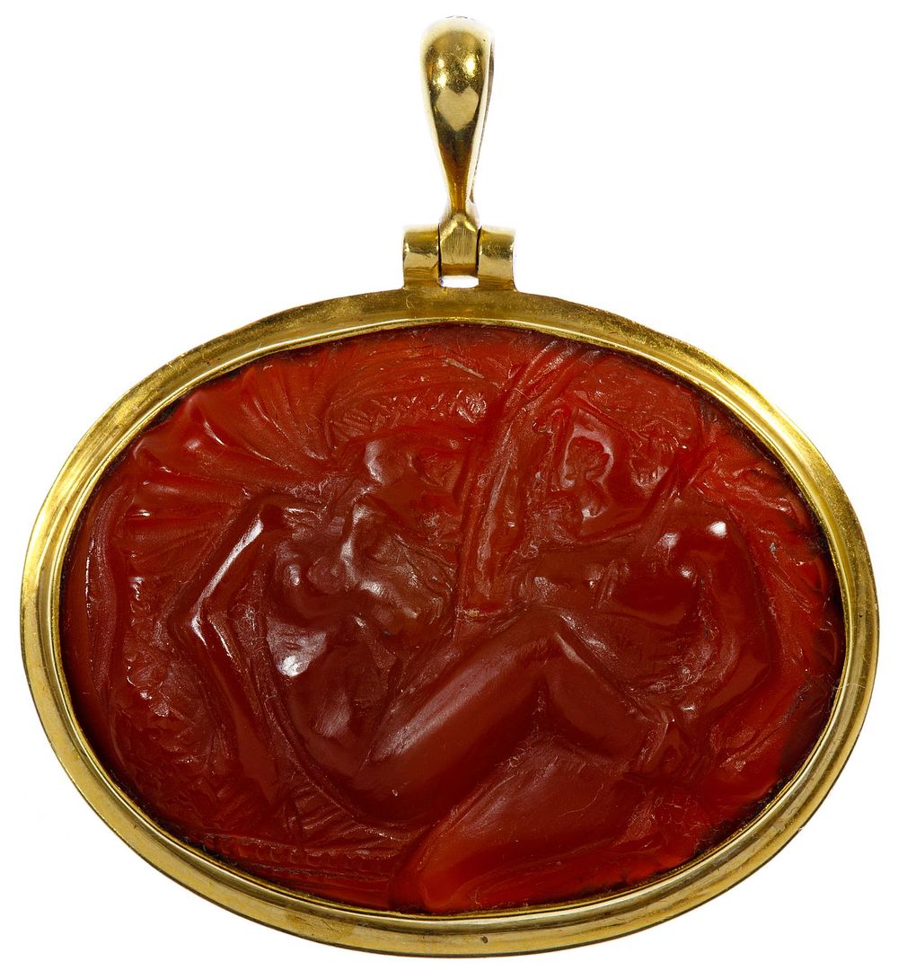 Lot 422: 18k Gold and Carved Quartz Pendant