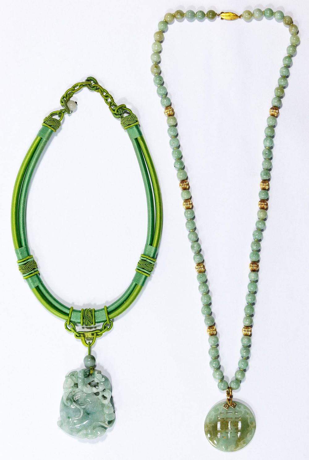 Lot 458: 14k Gold and Jadeite Jade Necklaces