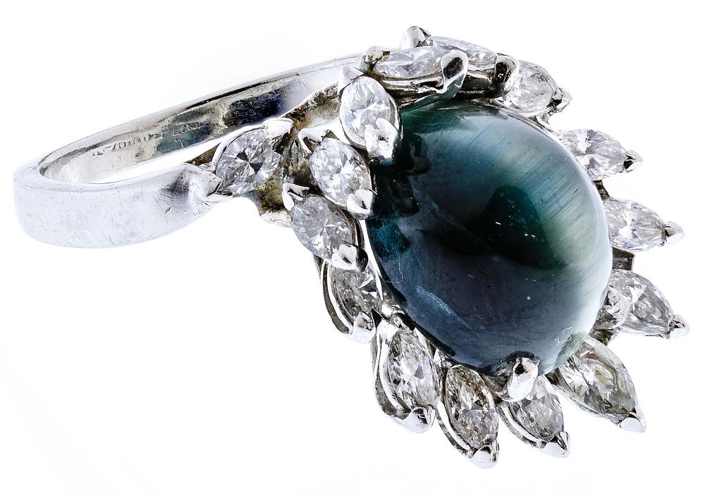 Lot 285: Platinum, Tiger Eye Tourmaline and Diamond Ring