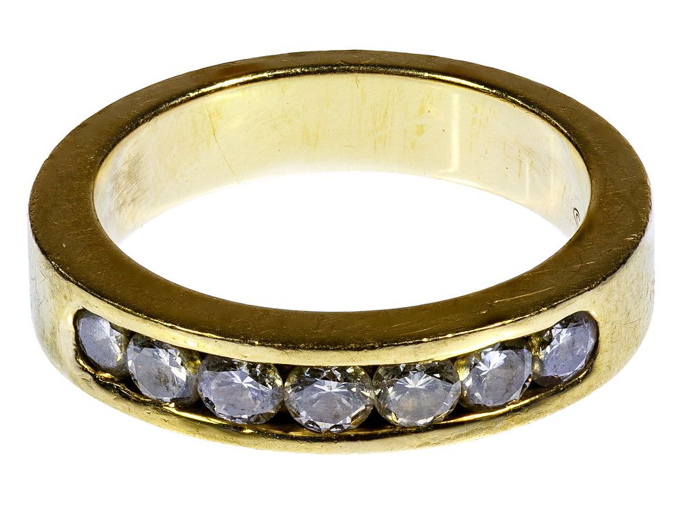 Lot 357: 14k Gold and Diamond Band Ring