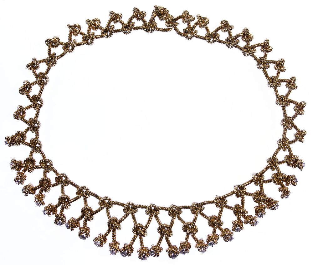 Lot 359: Verdura 14k Gold and Diamond Knot Necklace
