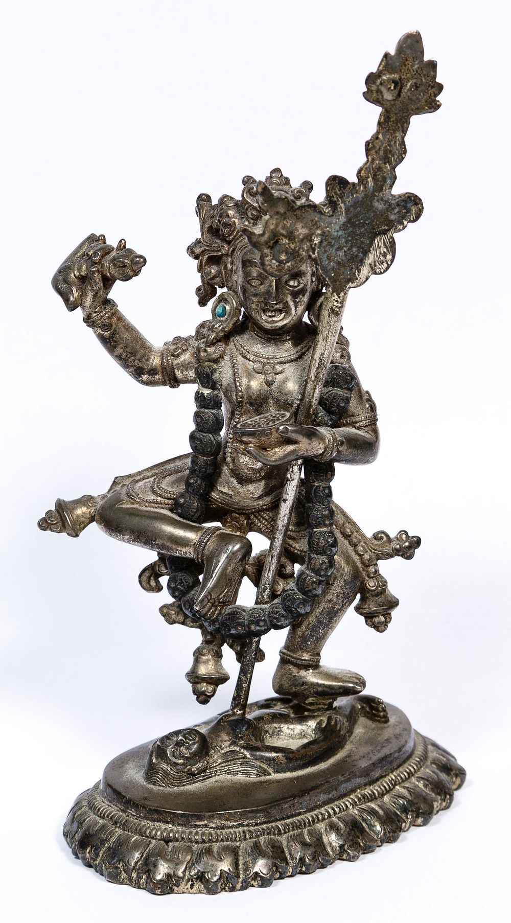 Lot 165: Tibetan Silver Cultural Protector Figure