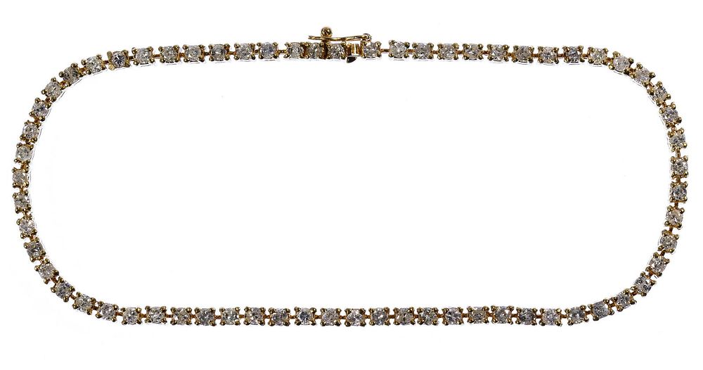Lot 208: 14k Gold and Diamond Tennis Bracelet